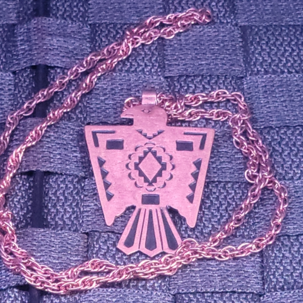 Copper Thunderbird necklace.